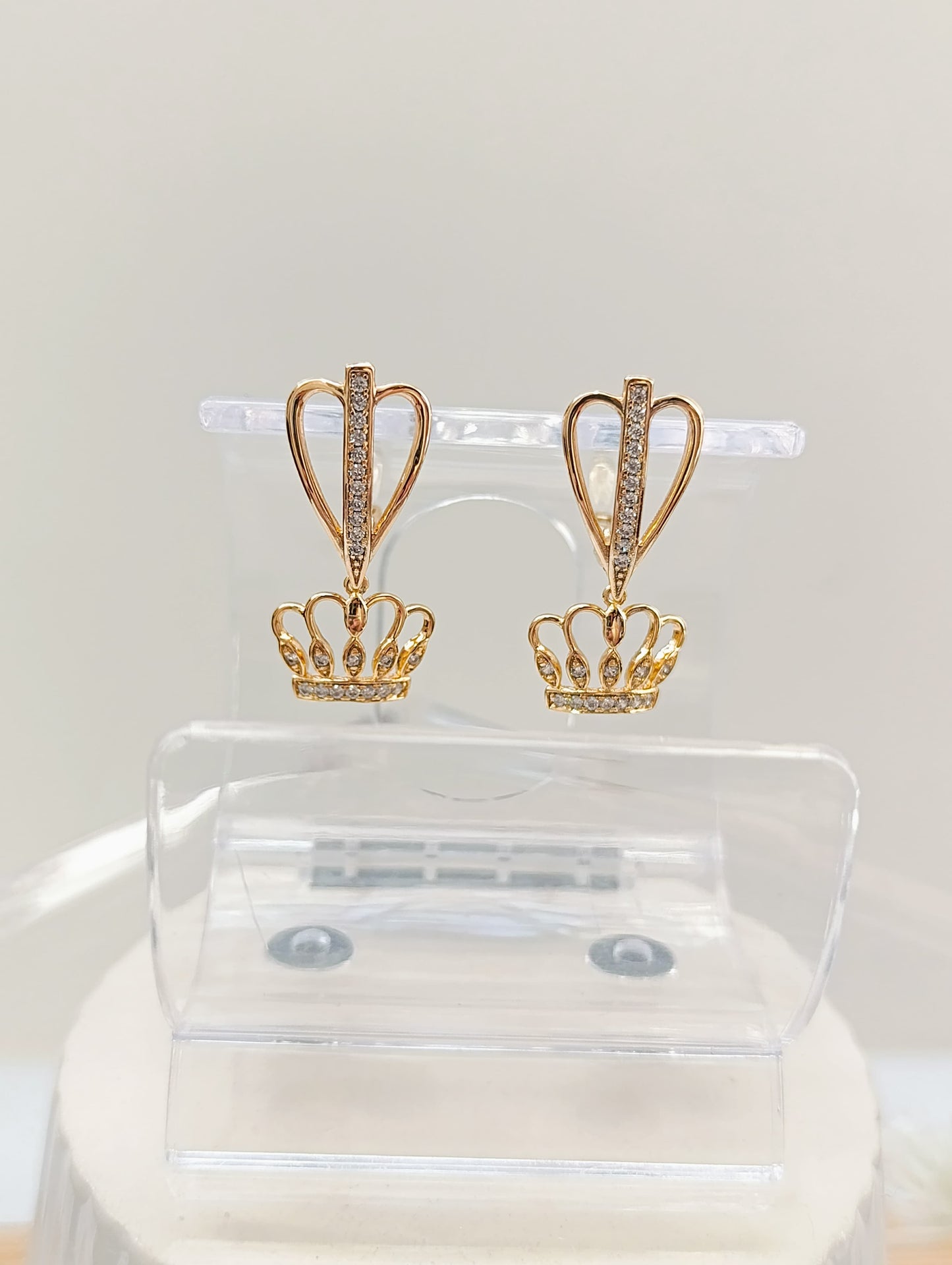 ARETES LARGOS CORONA