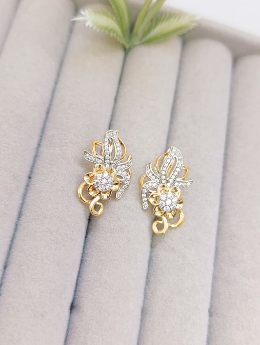 ARETES FLOR ADORNADA PLATEADO Y DORADO