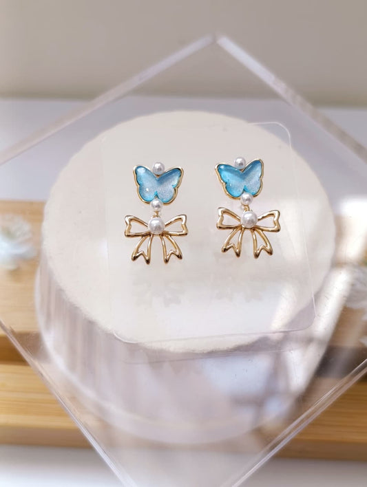 ARETES CORAZÓN CON MOÑA