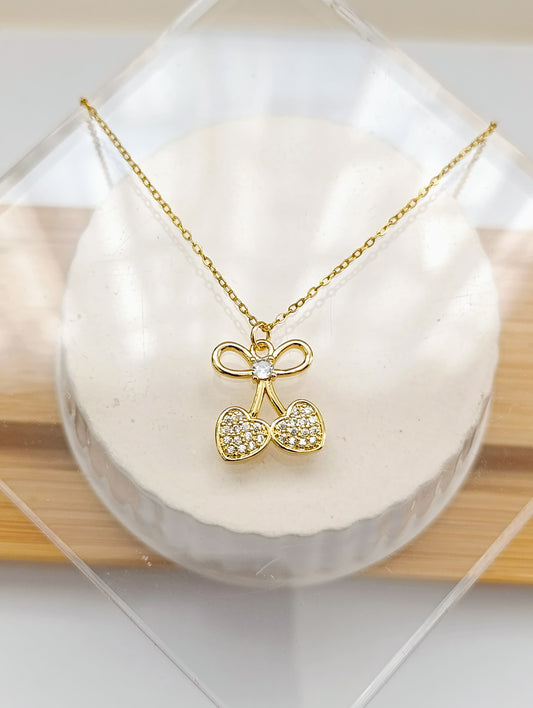 CADENA DIJE CEREZA CON MOÑO