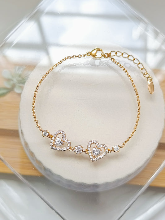 PULSERA CORAZONES DOBLES