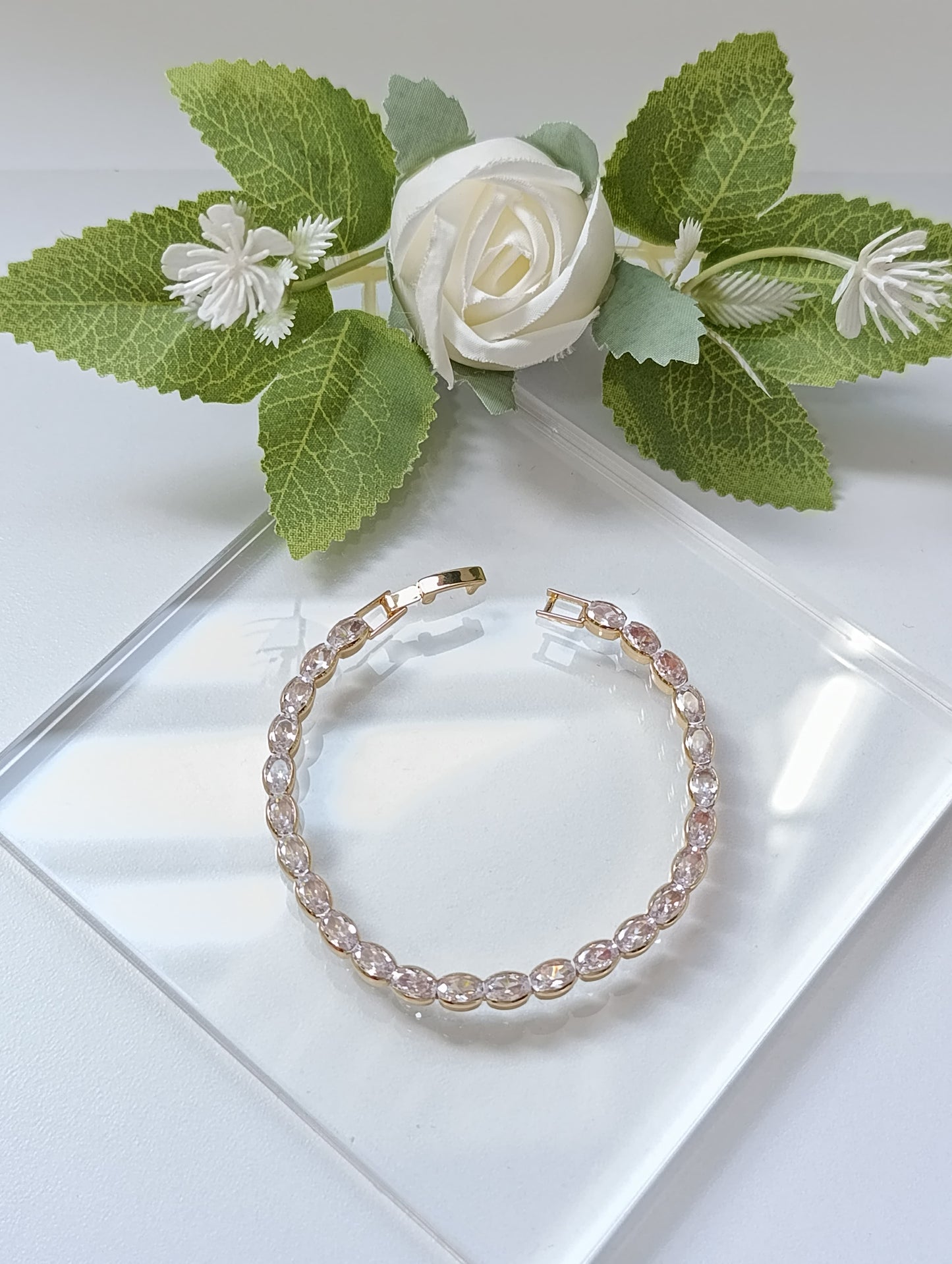 PULSERA DE BROCHE DORADA PIEDRAS OVALADAS